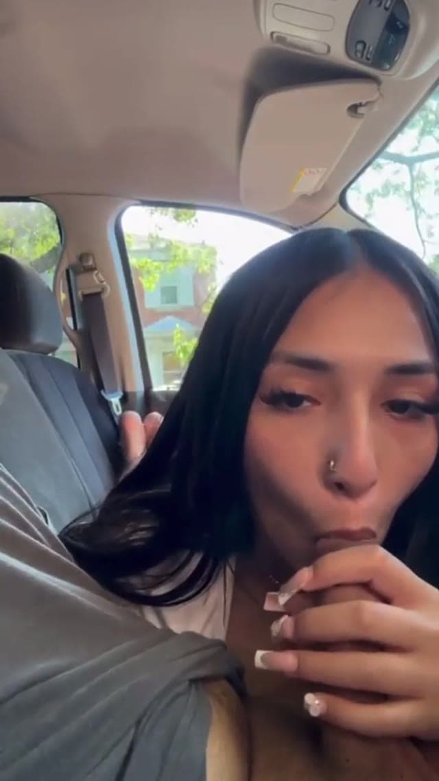 Sexy teen sucks her boyfriend’s dick in the car risky public blowjob