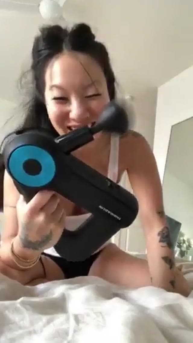 Asian milf talking my massage gun for a test drive