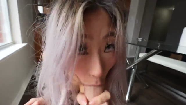 Sexy Asian slut sucking on a BWC